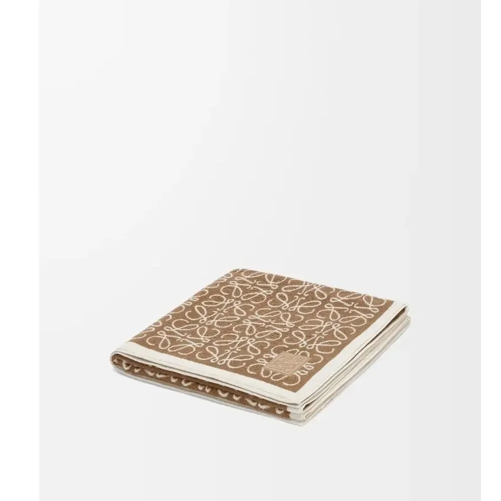 $750 Loewe Anagram towel in cotton